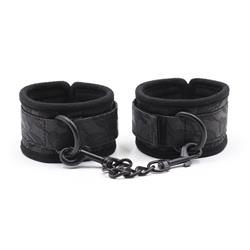 Adjustable handcuffs